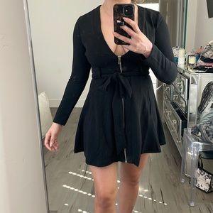 Black long sleeve cocktail dress.